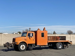 1998 International 4700 Crew Carrier 12’ Flatbed Truck