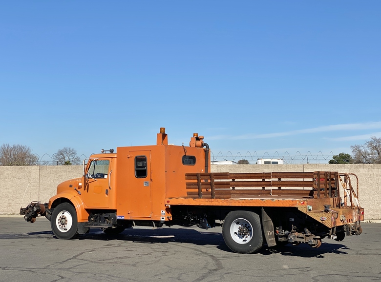 1998 International 4700 Crew Carrier 12’ Flatbed Truck
