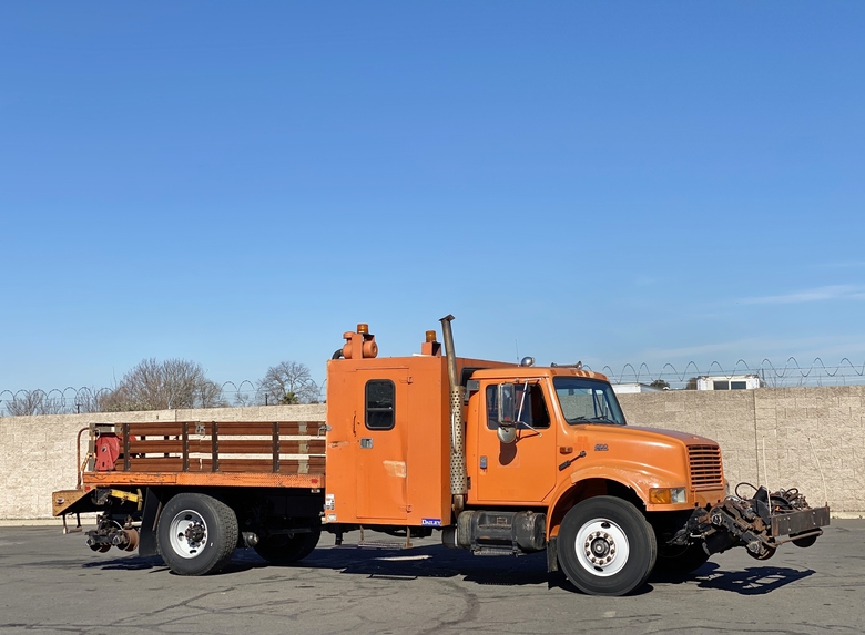 1998 International 4700 Crew Carrier 12’ Flatbed Truck