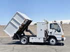1999 Isuzu NPR HD 8' Flatbed Dump Truck