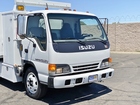 1999 Isuzu NPR HD 8' Flatbed Dump Truck