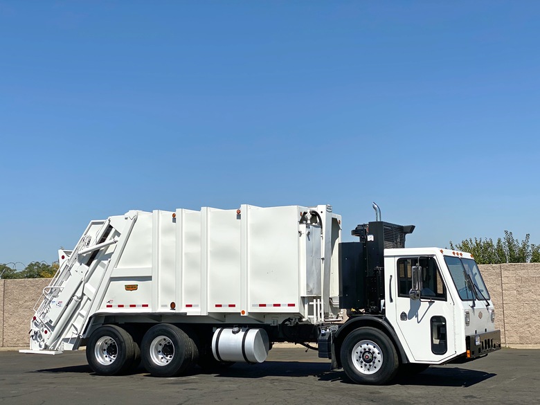 2011 CCC LET Low Entry Pak-Mor Rear Loader Garbage Truck
