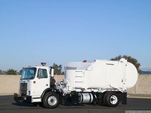 2008 Autocar Heil Rapid Rail Single Axle Side Loader